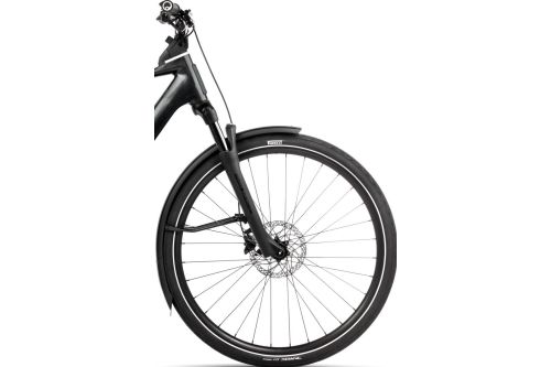 Rower elektryczny miejski trekkingowy miejski do jazdy na wycieczki po mieście po szutrach drogach polnych Orbea KEMEN TOUR 30 20mph 2